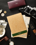 Dotted journal with a green band