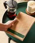 Eco-friendly A5 journal with recycled paper and a green spine