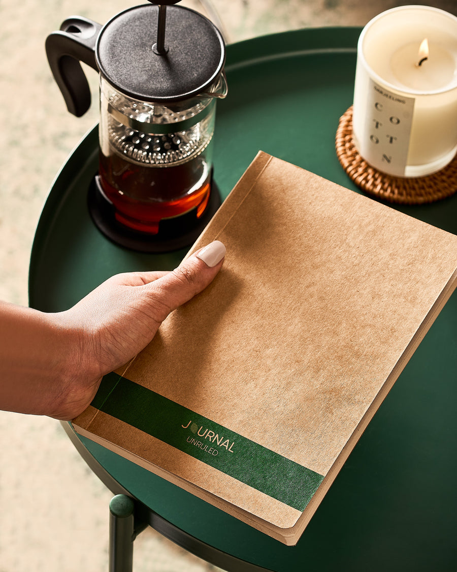 Eco-friendly A5 journal with recycled paper and a green spine